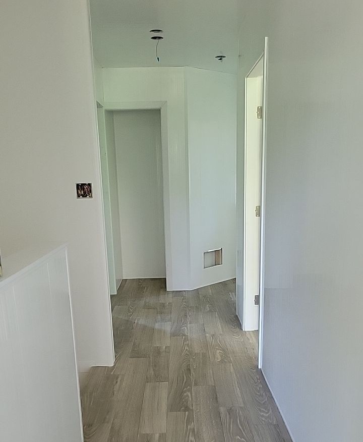 Trusscore installation by VIP Property Restorations in hallway of Cowichan Valley home