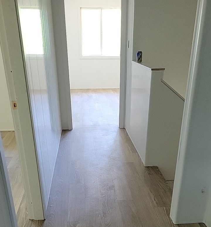 Trusscore installation by VIP Property Restorations in staircase landing of Cowichan Valley home