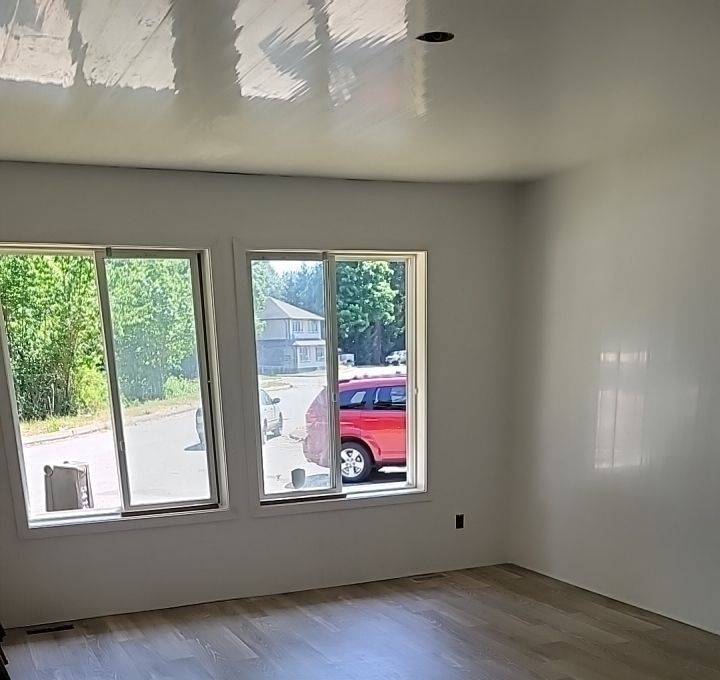 Trusscore installation by VIP Property Restorations in living room of Cowichan Valley home